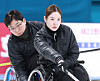 Curlers Nam Bong-gwang, left, and Baek Hye-jin [KOREAN PARALYMPIC COMMITTEE]