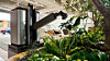A robot sprays water on plants at Hyundai Motor Group's headquarters in southern Seoul on May 14. [HYUNDAI MOTOR]