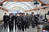 Kim Jong-un, in the center, walks into a weapons factory for inspection on May 11 in this Korean Central News Agency photo released on May 13. [YONHAP]