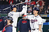 Korean baseball player Kim Hye-seong of Los Angeles Dodgers, right, celebrates a home run by Shay Whitcomb of the Houston Astros during a World Baseball Classic game between South Korea and the Czech Republic on March 5, at Tokyo Dome in Tokyo. [YONHAP]