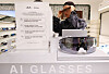 A person tries out Meta’s AI smart glasses at a sunglass store inside Shinsegae Department Store in central Seoul on May 25, the day of the products’ launch in Korea. Meta Platforms released the second-generation Ray-Ban Meta line featuring a 12-megapixel ultra-wide camera and open-ear audio, along with two styles of Oakley Meta smart glasses — Vanguard and HSTN — in Korea. [YONHAP]