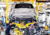 Employees at KG Mobility’s Pyeongtaek plant work on underbody components for the the company's Torres EVX model in this photo provided on April 24, 2024. [KG MOBILITY]