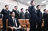 Prosecutor Park Sang-yong, second from left, sits after refusing to take the witness oath during a hearing on allegations of fabricated charges in the Ssangbangwool-North Korea remittance case, held by a parliamentary special committee investigating accusations of politically motivated prosecutions under the Yoon Suk Yeol administration at the National Assembly on April 14. [LIM HYUN-DONG]