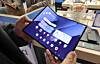 A customer examines a Samsung Galaxy Z Trifold at a store in Jung District, central Seoul, on Jan. 6. [YONHAP]