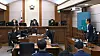 Former Prime Minister Han Duck-soo, far right, listens as judges sentence him to 15 years in prison at the Seoul High Court in Seocho District, southern Seoul, on May 7, 2026. [SEOUL HIGH COURT]