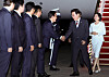President Lee Jae Myung, second from right, and first lady Kim Hea Kyung, right, greet officials including Prime Minister Kim Min-seok, third from right, as they return from a six-day trip to India and Vietnam at Seoul Air Base in Seongnam, Gyeonggi, on April 24. [JOINT PRESS CORPS]