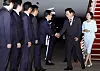 President Lee Jae Myung, second from right, and first lady Kim Hea Kyung, right, greet officials including Prime Minister Kim Min-seok, third from right, as they return from a six-day trip to India and Vietnam at Seoul Air Base in Seongnam, Gyeonggi, on April 24. [JOINT PRESS CORPS]