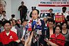People Power Party candidate Choo Kyung-ho answers reporters' questions on the morning of June 4 at his campaign office at the Beomeo intersection in Daegu as his win looks all but certain. [YONHAP]