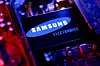 A Samsung Electronics logo and a computer motherboard appear in this illustration taken on Aug. 25, 2025. [REUTERS/YONHAP]