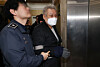 Jeon Seong-bae, right, a shaman known for his close ties to former first lady Kim Keon Hee, appears at the special counsel's office in southern Seoul to undergo questioning on Jan. 19. [YONHAP]