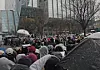 Fans of boy band Wanna One wait outside CJ ENM’s headquarters in Mapo District, western Seoul, on April 6 for a meet-and-greet ahead of the premiere of the group’s reality show, “Wanna One Go: Back to Base,” on April 28. The program marks the group’s reunion, seven years after its disbandment in 2019. [SHIN HA-NEE]