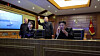 North Korean leader Kim Jong-un, right, and his daughter Kim Ju-ae watch a live feed of a strategic cruise missile test from the destroyer Choe Hyon at an undisclosed location in North Korea on March 10, in a photo carried by Korean Central News Agency the following day. [YONHAP]