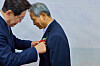 President Lee Jae Myung gifts a carnation flower to his elementary school teacher in his hometown of Andong, North Gyeongsang, on May 15, Teachers' Day. [BLUE HOUSE]
