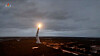 North Korea conducts a test launch of a new high-altitude, long-range surface-to-air missile over the East Sea on Dec. 25, 2025, under the observation of its leader, Kim Jong-un. [YONHAP]