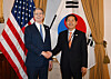 Korean Finance Minister Koo Yun-cheol shakes hands with U.S. Treasury Secretary Scott Bessent in Washington on April 17. [MINISTRY OF FINANCE AND ECONOMY]