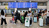 A tourist group arrives at Incheon International Airport on May 1. [YONHAP]
