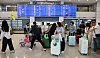 A tourist group arrives at Incheon International Airport on May 1. [YONHAP]