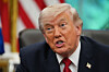 U.S. President Donald Trump speaks to reporters in the White House in Washington on April 29. [AP/YONHAP]