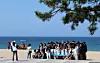 Students on a school trip take photos and make happy memories at Gyeongpo Beach in Gangneung, Gangwon, on April 30.[YONHAP]