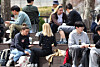 International students eat and talk among each other at a university campus in Seoul on April 9, 2025. [YONHAP]