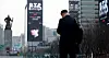 An advertisement for the Netflix live streaming of BTS’s upcoming “Arirang” comeback performance is displayed on a billboard near Gwanghwamun Square in Jongno District, central Seoul, on March 11. [NEWS1]