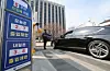 A notice for the public sector five-day vehicle rotation system is posted in front of the Government Seoul Complex in Jongno District, central Seoul, on March 24. The system takes effect at midnight on March 25. [NEWS1]
