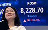 The Kospi's close at 8,228.70 points is displayed on a screen in a trading room in central Seoul on May 27. [NEWS1]
