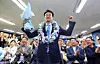Gyeonggi education superintendent-elect An Min-suk cheers on June 4 at his campaign office in Suwon, Gyeonggi, after his win became certain. [NEWS1]