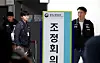 Choi Seung-ho, the head of the Samsung Electronics chapter of the Samsung Group United Union, right, leaves the government-mediated negotiations with management that collapsed in Sejong on May 13. [NEWS1]