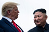 U.S. President Donald Trump and North Korea's leader Kim Jong-un talk before a meeting in the Demilitarized Zone (DMZ) on June 30, 2019, in Panmunjom. [AFP/YONHAP]