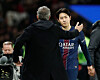 Paris Saint-Germain's Lee Kang-in shakes hands with coach Luis Enrique after being substituted during his team's match with Liverpool at Parc des Princes in Paris on April 8. [REUTERS/YONHAP]