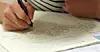 A test taker marks answers for the Test of Proficiency in Korean [JOONGANG ILBO]