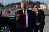 U.S. President Donald Trump gestures after stepping off Air Force One at Miami International Airport in Miami, Florida on March 7. [AP/YONHAP]