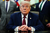 U.S. President Donald Trump listens in the Oval Office of the White House in Washington on April 18.[AP PHOTO/YONHAP]
