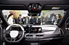 Ambassadors and diplomatic corps to Korea listen to an explanation about Kia’s EV5 at the automaker's booth during the World IT Show 2026 at Coex in Gangnam District, southern Seoul, on April 23. Fourth from left is Ryu Je-myung, the second vice minister of the Ministry of Science and ICT. [NEWS1]