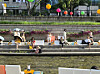 Visitors read books at the Seoul Outdoor Library along Cheonggyecheon in central Seoul on May 22. [CHO JUNG-WOO]