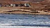 Ice floes drift along the Imjin River near a village in Kaepung County, North Hwanghae Province, North Korea, as seen from the Odusan Unification Observatory in Paju, Gyeonggi, on Feb. 8. [YONHAP]