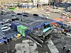 Police control traffic at the scene where a drilling rig fell and made contact with a passing taxi at Manchon Intersection in Suseong District, Daegu, on March 4, injuring three people including the driver. [NEWS1]
