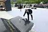 Oh Tae-wan, then Uiryeong County governor of South Gyeongsang, lays flowers at a memorial service for the so-called “Woo Bum-kon shooting incident” at the Uiryeong April 26 Memorial Park in Pyeongchon-ri, Gungnyu-myeon, Uiryeong, on the morning of April 26, 2024. The incident refers to a massacre carried out from the night of April 26 to the early hours of the following day in 1982, when Woo Bum-kon, a police officer assigned to the Gungnyu substation of Uiryeong Police Station, seized firearms and ammunition and killed 56 residents in the area, while leaving more than 30 others dead or seriously injured. [YONHAP]