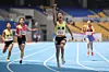 Wang Seo-yoon, a 14-year-old sprinter, second from right, crosses the finish line during the girls’ middle school race at the 55th National Junior Sports Festival at Busan Asiad Main Stadium on May 24. [KOREA ASSOCIATION OF ATHLETICS FEDERATION]