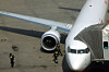 A plane is parked at an apron area in Incheon International Airport's Terminal 1 on March 16. [YONHAP]