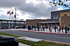 This image taken from video provided by KSAT shows parents waiting in line outside Bulverde Middle School to be reunited with their children after a teacher was shot by a student at Hill Country College Preparatory High School on March 30 in Bulverde, Texas. [AP/YONHAP]