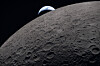 In this image provided by NASA, the Artemis II crew captured this view as the Earth sets behind the Moon during a lunar flyby on April 6. [AP/YONHAP]