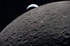 In this image provided by NASA, the Artemis II crew captured this view as the Earth sets behind the Moon during a lunar flyby on April 6. [AP/YONHAP]