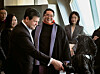 Bob McCooey, the vice chairman of Nasdaq, is shaking a robot's hand at Galaxy Corporation headquarters in Yeouido, western Seoul, on Feb. 4. [GALAXY CORPORATION]