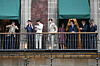 Mexico's President Claudia Sheinbaum, fourth from right, looks at BTS members as they acknowledge fans from the balcony of the National Palace at the Zócalo square in Mexico City on May 6. [AFP/YONHAP]