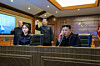 North Korean leader Kim Jong-un, right, and his daughter Kim Ju-ae watch a test launch of a strategic cruise missile from the destroyer Choe Hyon via video link on March 10, in this photo carried by the North's official Rodong Sinmun the following day. [NEWS1]