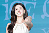 Yuna of girl group ITZY poses for photos during a press conference for her solo debut EP, ″Ice Cream,″ at Pullman Ambassador Seoul Eastpole hotel in eastern Seoul on March 23. [NEWS1]