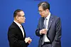 National Security Adviser Wi Sung-lac, left, speaks with Foreign Minister Cho Hyun ahead of a Cabinet meeting at the Blue House in central Seoul on April 6. [JOINT PRESS CORPS]
