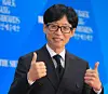 Comedian Yu Jae-suk poses for a photo on the red carpet ahead of the 61st Baeksang Arts Awards at Coex in Gangnam District, southern Seoul, on May 5, 2025. [YONHAP]